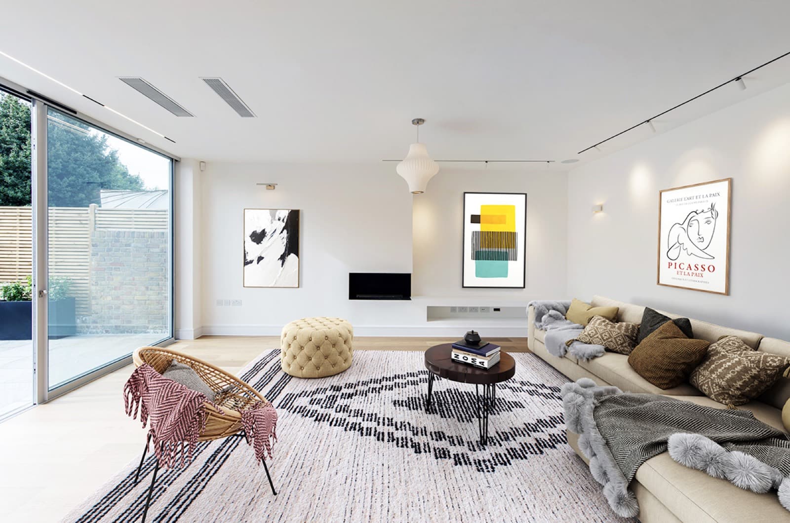 The same living room virtually staged with furniture